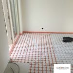 Variotherm lage opbouw vloerverwarming in woonkamer en keuken